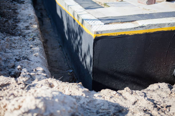 Professional Waterproofing technician working in Stockbridge, GA